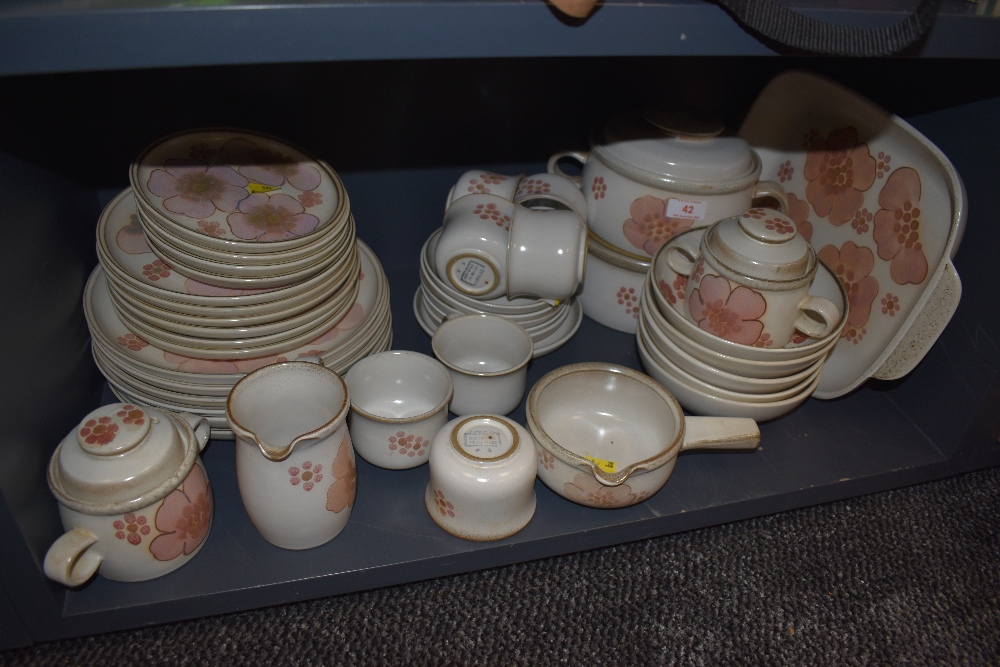 An extensive collection of vintage Denby including plates, tureens, mugs, cups and saucers and