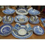 A selection of vintage blue and white ware,tureens, bowls, plates and more included,around thirty