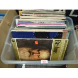 A selection of vinyl records and albums including pop and rock interest