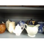 A varied lot of vintage ceramics and glass including jugs, tea pots and lidded jugs