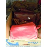 A selection of vintage leather and similar hand bags including bright red