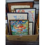 A box of needle works, prints and original art works.