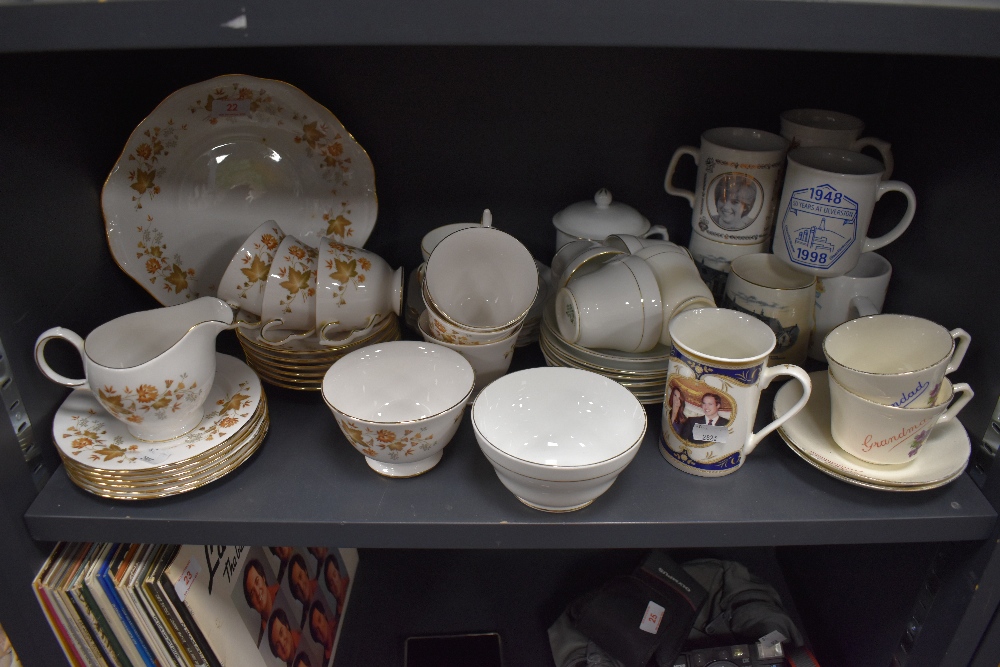 A mixture of ceramics including Colclough cups and saucers, commemorative mugs Stanley china and