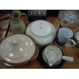 A selection of ceramics including Poole bowl Tremar style jug and train mug