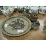 A selection of naturalistic stoneware glaze figures and display plate