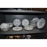 A large collection of Royal Copenhagen plates, cups and saucers,around thirty six items.