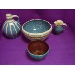 A selection of local interest studio pottery and ceramics including Ambleside polka dot and