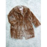 A good quality vintage fur coat.medium size.