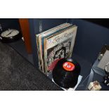 A collection of vinyl LP records and 45 singles including rock and roll, easy listening and more.