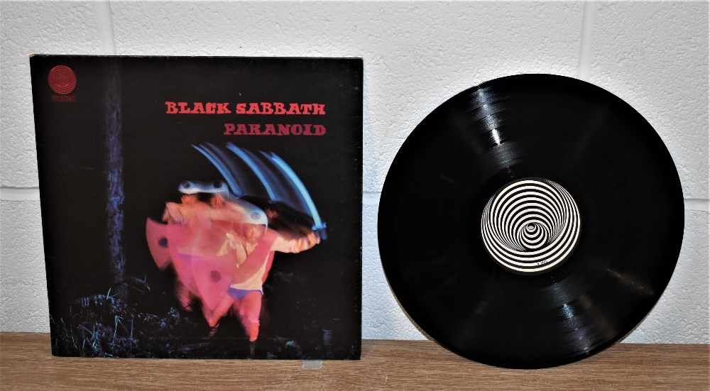 An original UK Vertigo press of Paranoid by Black Sabbath - vinyl is VG+ - would benefit from a