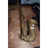 A vintage brass saxophone stamped THIBOUVILE-LAMY, LONDON/PARIS, CONDITION REPORT - lost its sheen