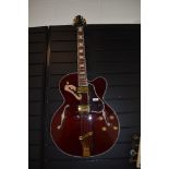 A Samich Greg Bennett 17' Archtop, solid spruce top, wine red , Duncan design pickups, grover