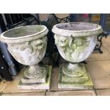 A pair of large concrete garden urns, height approx. 73cm