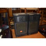 A vintage teak effect hifi cabinet and Sharp music centre