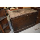 A vintage stained frame blanket box, bears name E S Holland, later green beize lined interior,