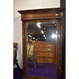 A Victorian oak framed large overmantel or hall mirror, having column supports, approx. 154 x 100cm