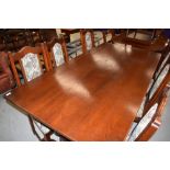 A modern Old Charm or similar refectory table and six dining chairs