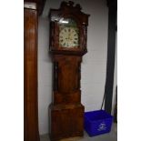 A late 19th Century flame mahogany long case clock having painted arch dial , 8 day movement,