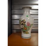 A reproduction Oriental vase, nice decorators piece, height approx. 36cm, some cracking to neck