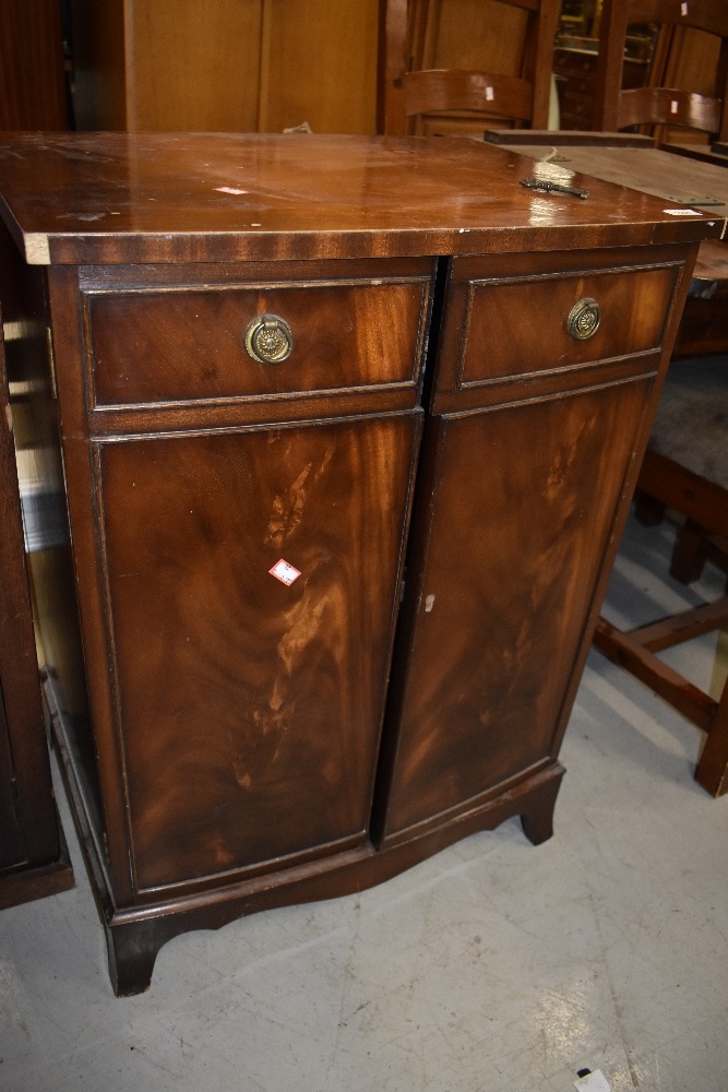 A reproduction Regency side cabinet, previously used as a hifi cabinet, bow front, width approx.