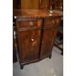 A reproduction Regency side cabinet, previously used as a hifi cabinet, bow front, width approx.