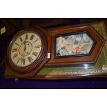 A late 19th/early 20th Century part mahogany cased wall clock, enamelled face worn, possibly