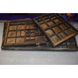 A selection of vintage printers trays