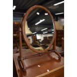 A Victorian mahogany toilet mirror, on turned frame, width approx. 58cm
