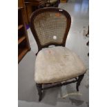 A Victorian mahogany dining chair having stuffed seat and bergere back (needs attention)