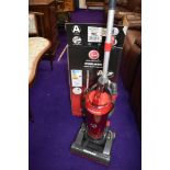 A Hoover Whirlwind 750W WR71 bagless vacuum cleaner in pearl grey and race red