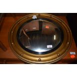 A vintage convex wall mirror, diameter 52cm