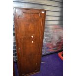 A vintage stained frame narrow cupboard