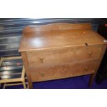 An early 20th Century golden oak bedroom chest of two drawers, width approx. 95cm, nicely made