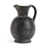 Etruscan Bucchero Oinochoe, 7th - 6th century BC; height cm 20,5; Restored rim. Provenance: