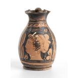 Apulian Red-Figure Oinochoe, 4th century BC; height cm 14,5; With a female head in profile,