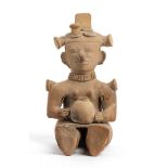 Terracotta Seated Female Statuette holding Jar, Ecuador, Jama-Coaque Culture, ca. 6th - 12 century