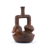 Stirrup-spouted bulbous bottle, Peru, Chavin Culture, ca. 7th century BC; height cm 27,2.