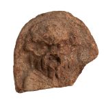 Greek Terracotta Antefix with Silenus, 5th - 4th century BC; height cm 17, length cm 18. Provenance: