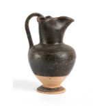 Apulian Black-Glazed Trefoil Oinochoe, 4th - 3rd century BC; height cm 18; Intact. Provenance: