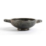 Apulian Black-Glazed Small Double Handled Bowl, 4th - 3rd century BC; height cm 4,5, diam. cm 11,