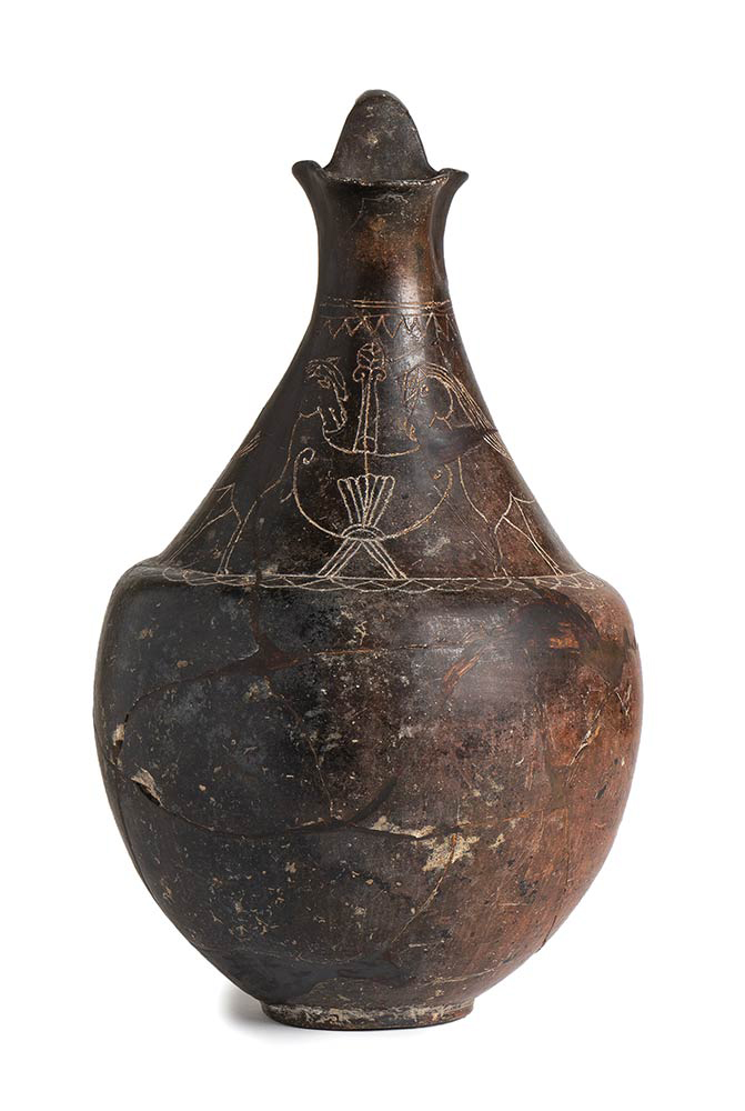 Faliscan Oinochoe with Incised Decoration, 7th century BC; height cm 27; Incised decoration consists