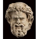 Roman Marble Relief of a Satyr, 2nd century AD; height cm 19 (cm 24,5 with Iron support); An