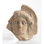 Greek Terracotta Antefix with Goddess, 4th century BC; height cm 17,5, length cm 16,5; The antefix