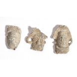 Group of Three Roman Lead Toys, Masks, 1st - 4th century AD; length max cm 2. Provenance: English
