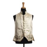 SILK AND LINEN VEST Late 18th Century Embroidered ivory silk and linen vest. Bust 100 cm General