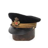 Italy, kingdom, a colonial infantry full dress peack cap Nice black wool cap with rank insigna and