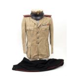 Italy, kingdom , a Carabinieri colonial officer’s uniform Four-pocket cotton jacket with blue-