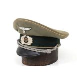 Germany III Reich an infantry officer’s schirmutze Feldgrau cap with white trim, dark green cloth