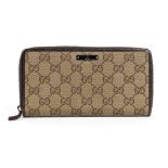 GUCCI CANVAS WALLET 2006 ca Beige monogram logo canvas and brown leather wallet General conditions