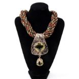 MULTICOLOUR SILK CORD NECKLACE WITH LARGE GUILDED BRONZE PENDANT AND TWO LEMON CITRINE STONES